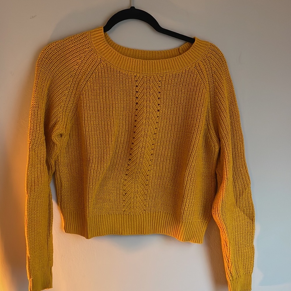 2 sweaters orange and green